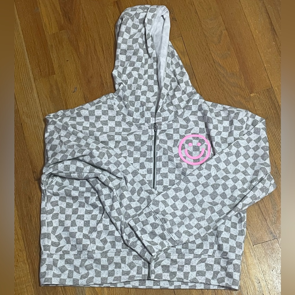 Checkered pattern with pink smiley